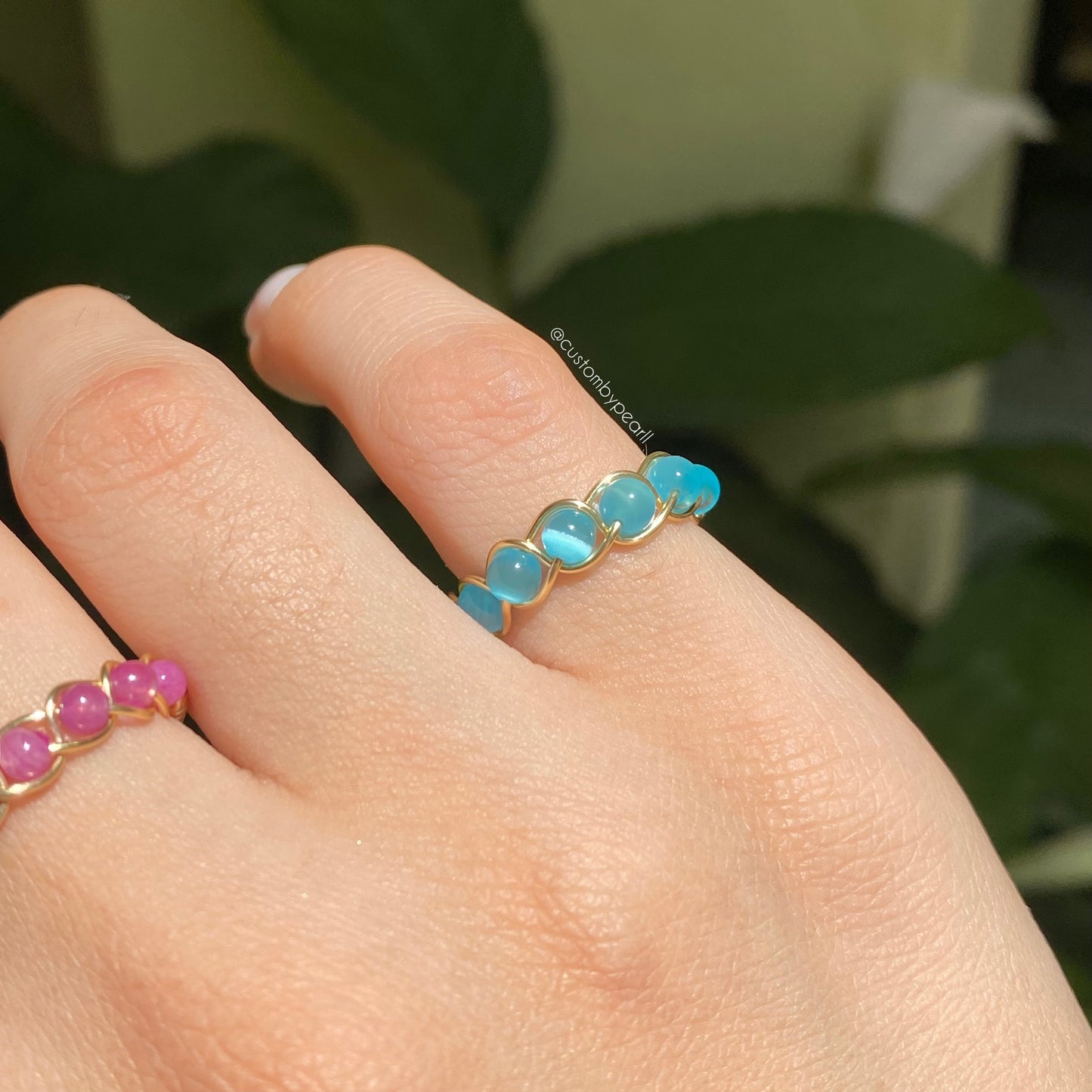 Anillo trenzado de ojo de gato azul