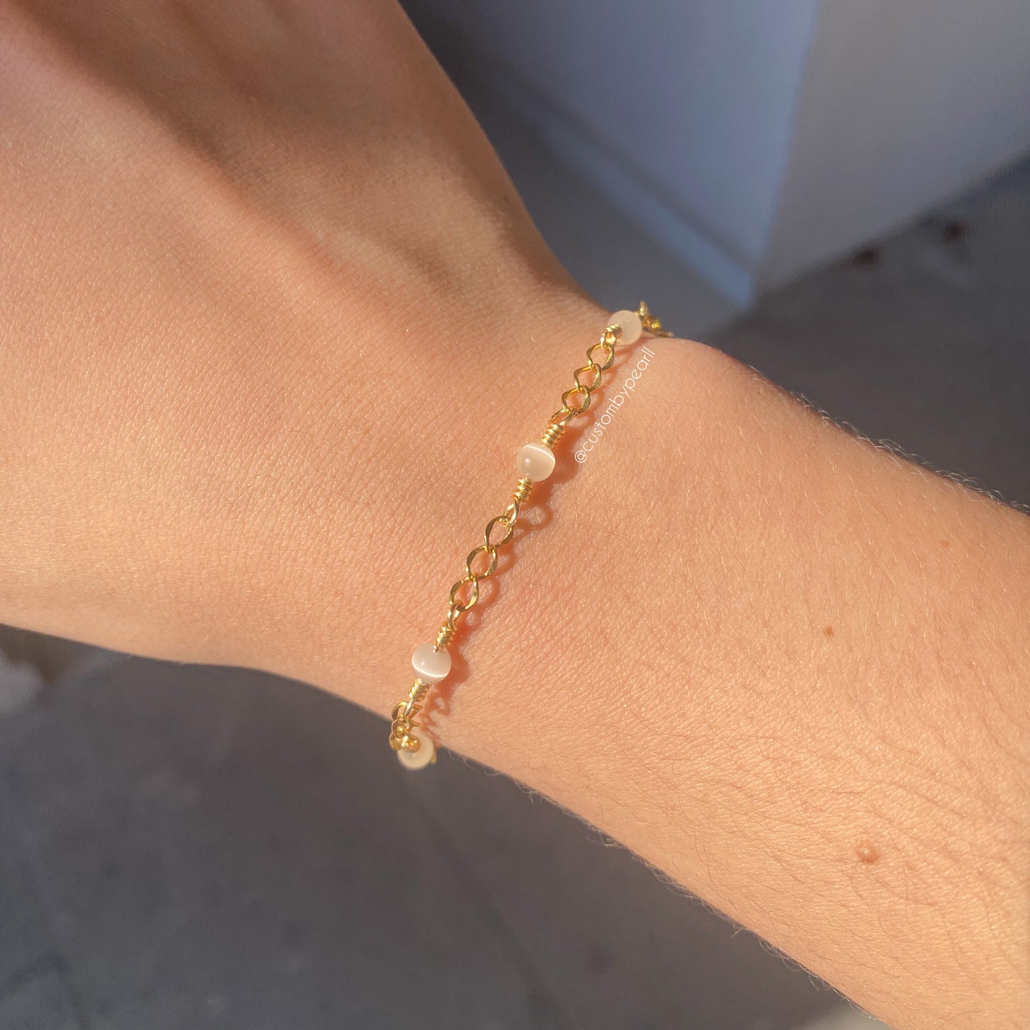 Pulsera ojo de gato y cadena